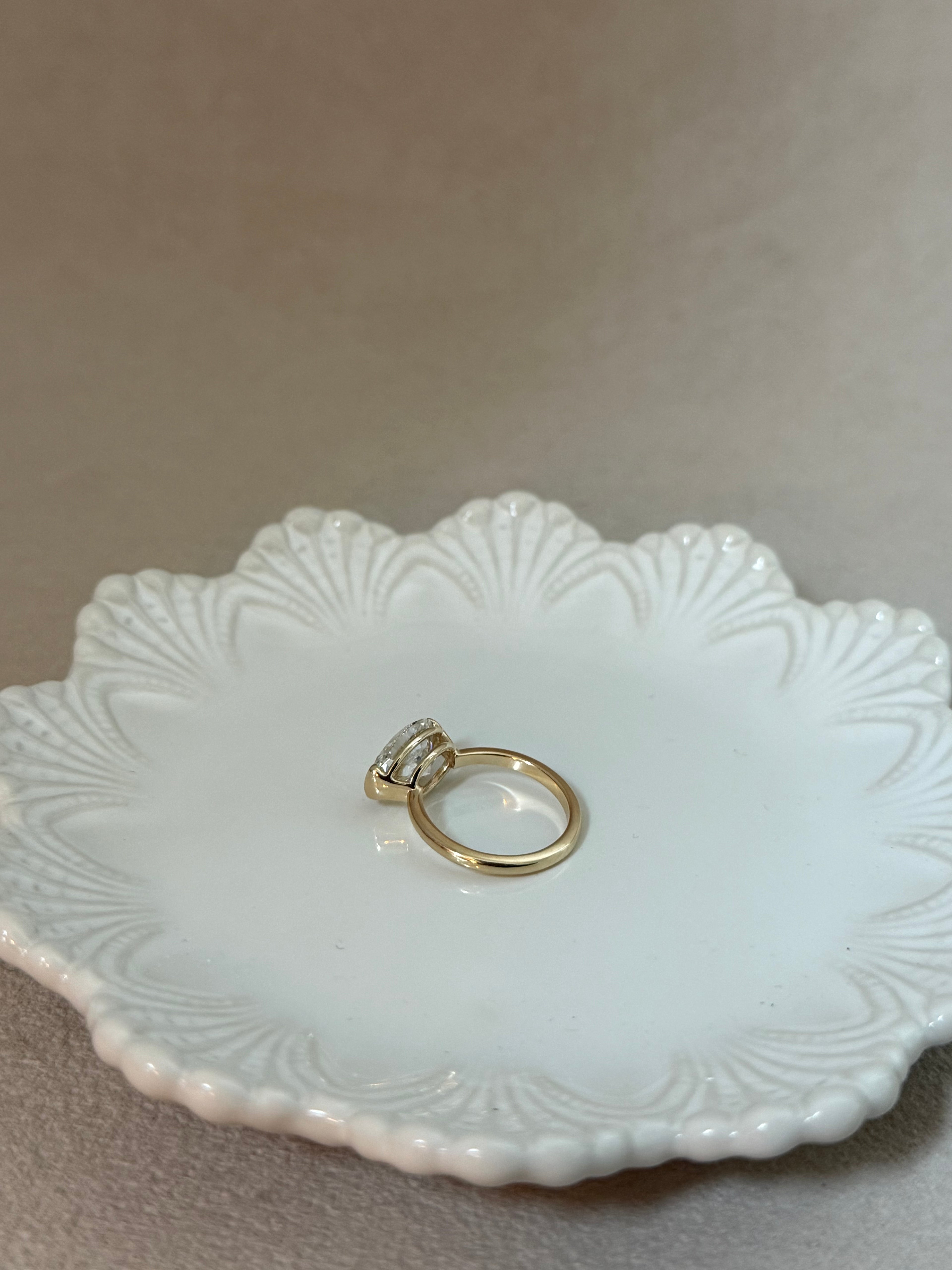 The Naomi: East-West Half Bezel Oval-Cut Lab Diamond Solitaire Ring