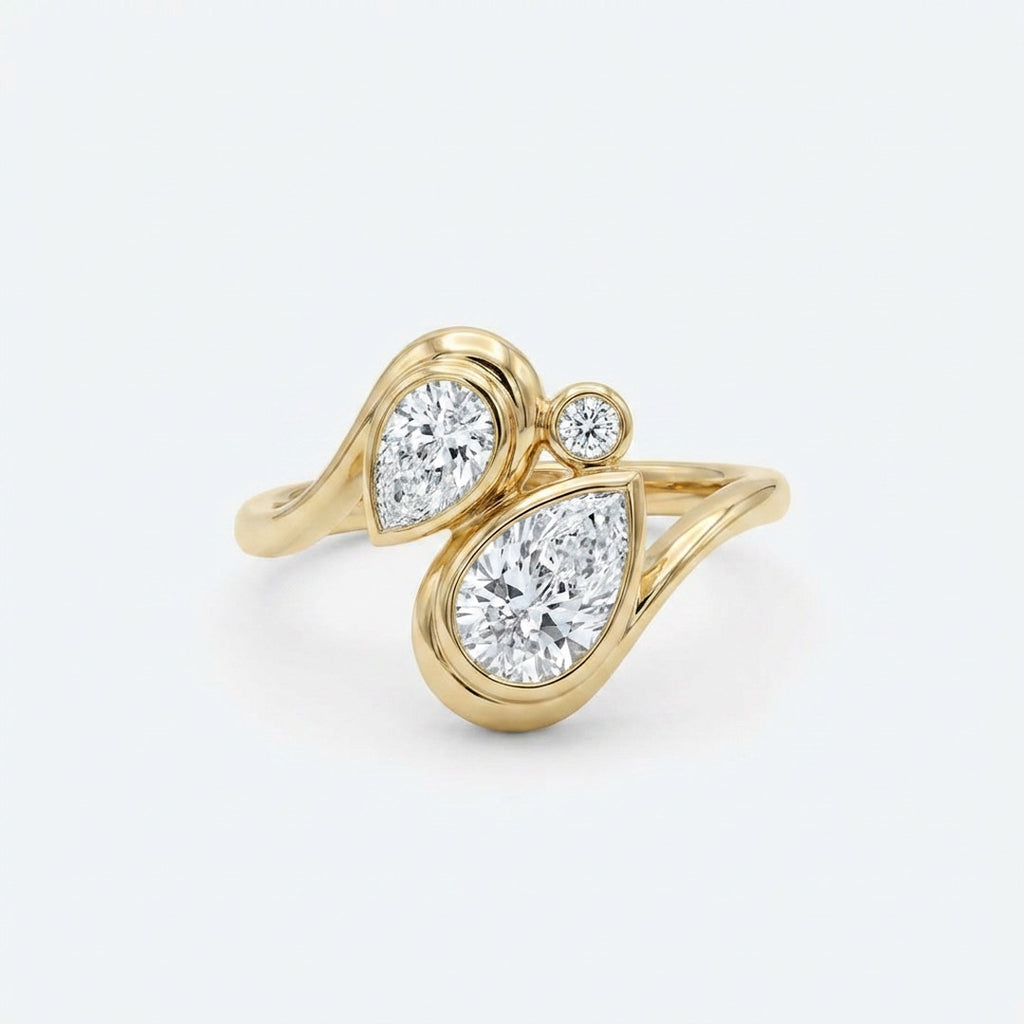 The Trielle: Pear-Cut Toi et Moi Lab Diamond Ring