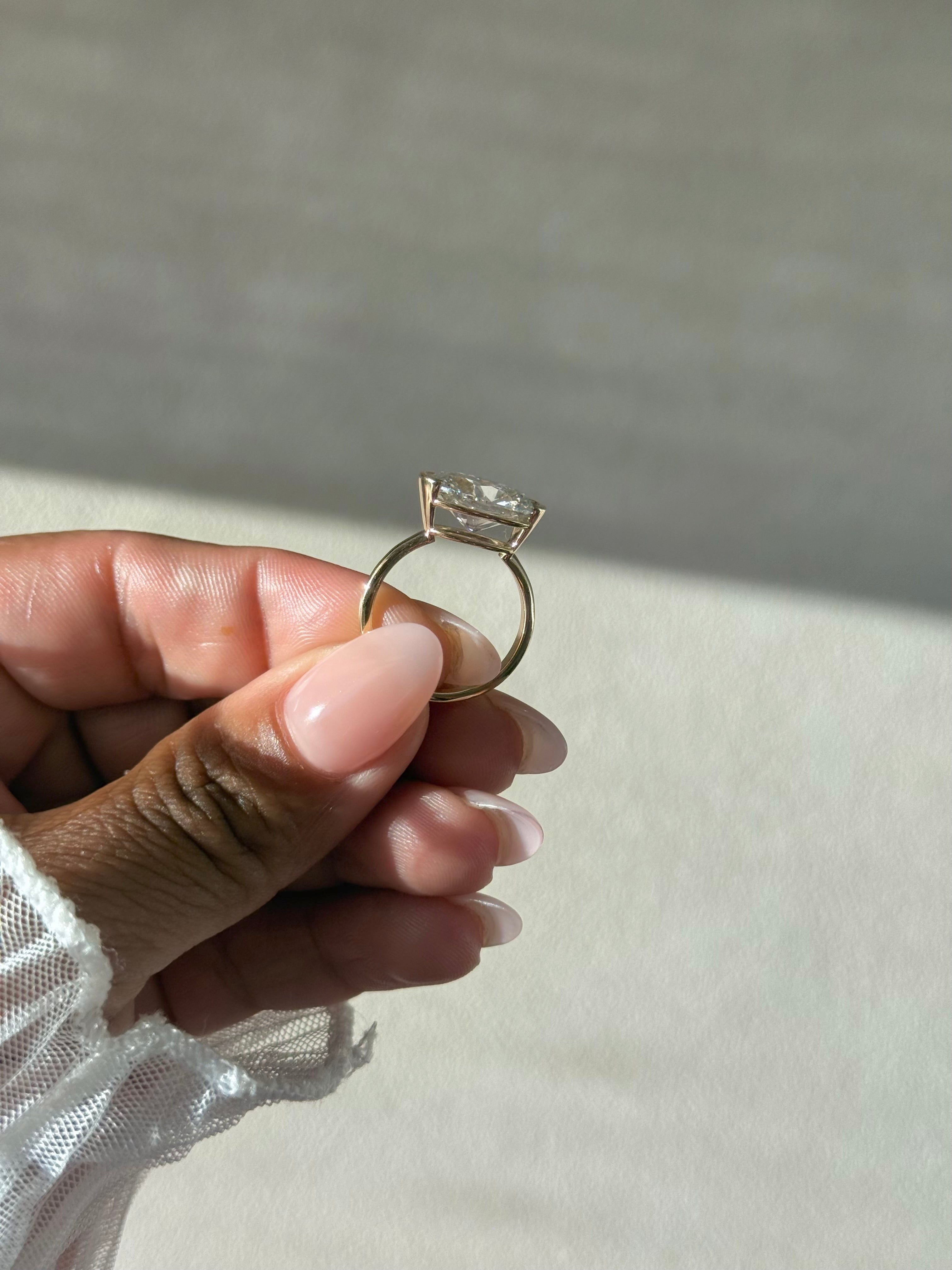 The Naomi: East-West Half Bezel Oval-Cut Lab Diamond Solitaire Ring